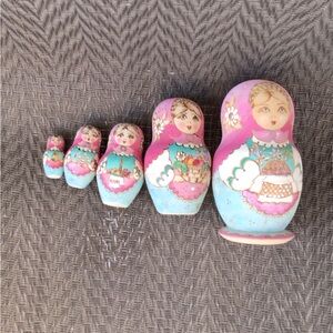 R. Ceprueb Signed Colorful Wooden Nesting Dolls Set